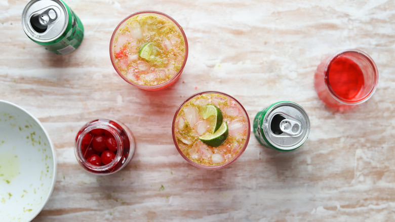 assembling cherry limeade drinks