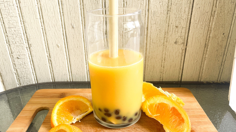 orange juice with boba