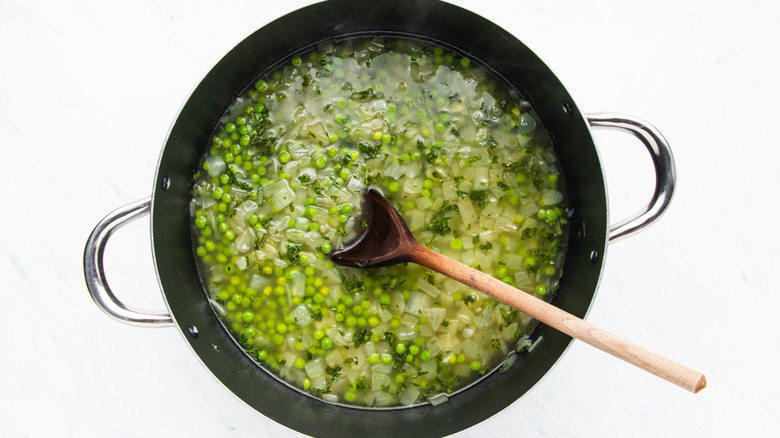making pea soup in pot