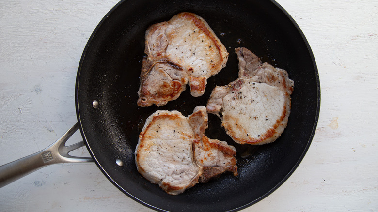 pork chops in skillet