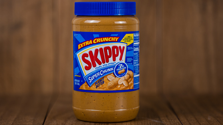 Skippy Crunchy jar on wood