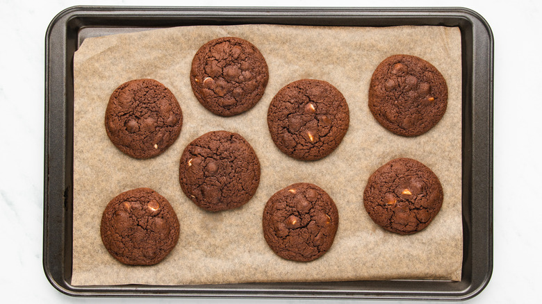 Chocolate cookies on baking sheet