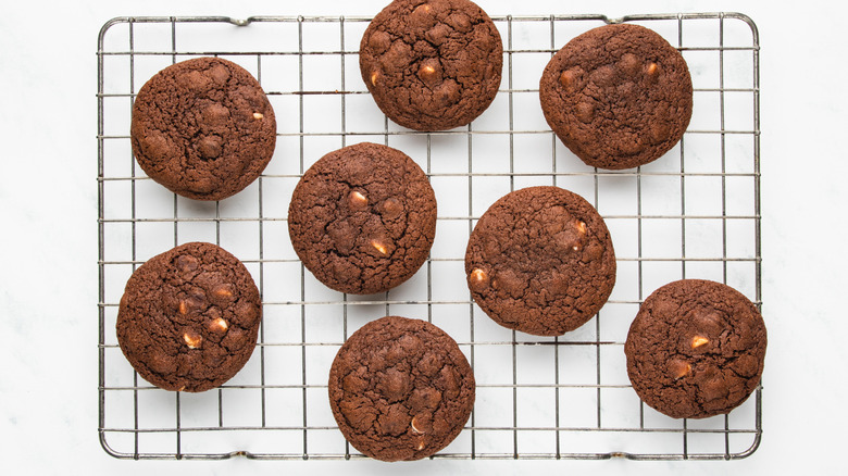 Chocolate cookies cooling on wire rack