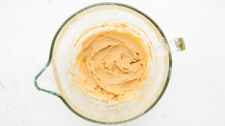 Making cookie dough in mixing bowl