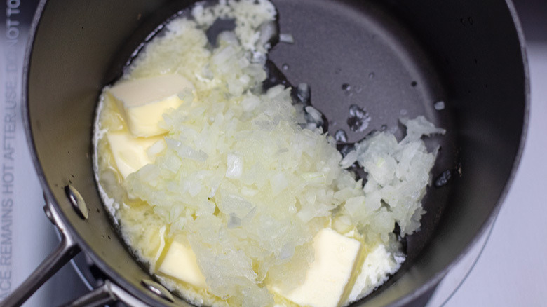 Slow Cooker Au Gratin Potatoes - onions sauteing