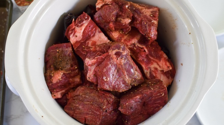 raw meat in slow cooker