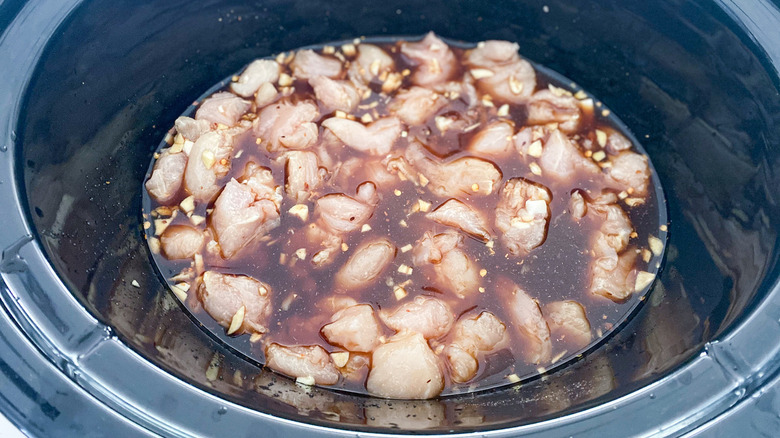 Chicken marinating in Bourbon glaze