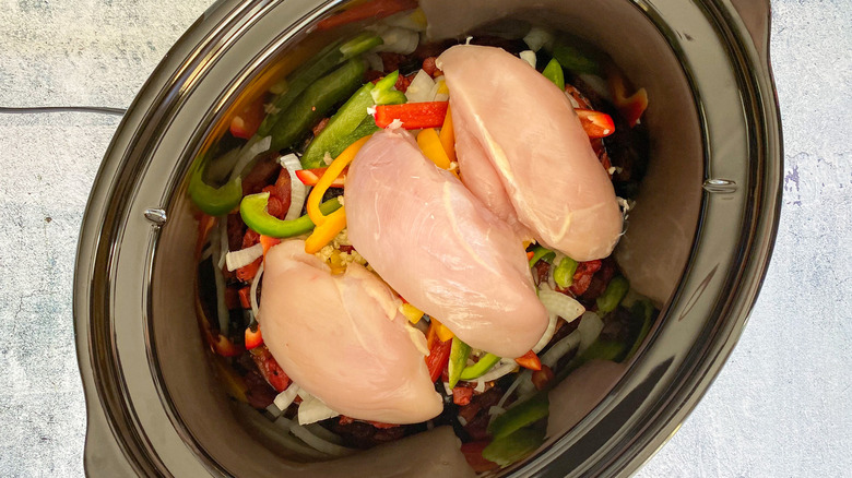 chicken and veggies in cooker