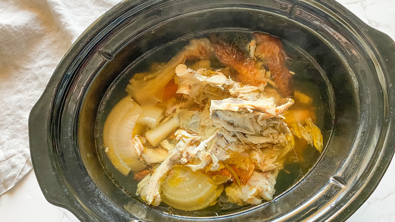 Slow cooker chicken stock recipe veggies in a slow cooker 