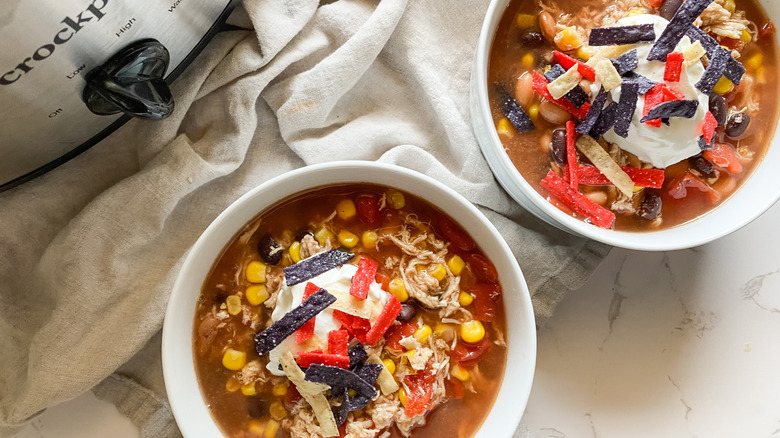 Slow cooker chicken taco chili in crockpot in bowl
