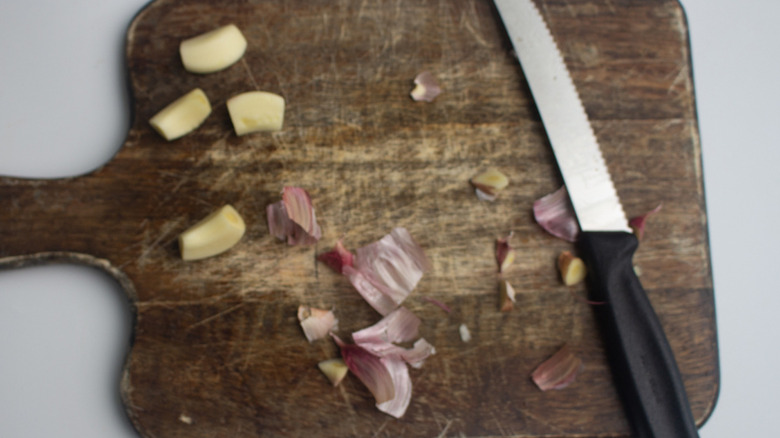 chopped garlic on cutting board