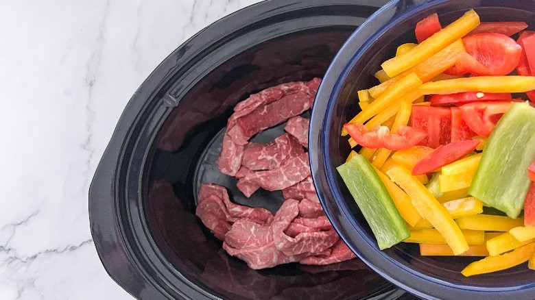 steak and peppers in slow cooker