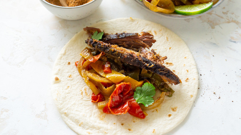 Fajita meat on tortilla