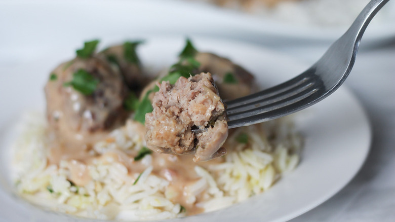 Meatballs with rice on plate