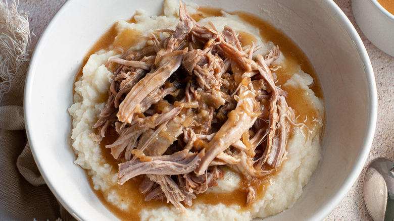 Shredded pork on mashed potatoes