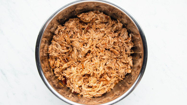 Shredded salsa chicken in a bowl