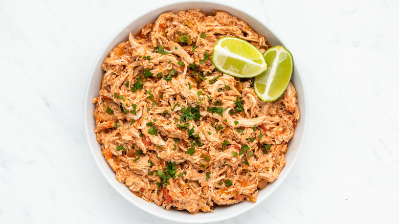 Shredded salsa chicken in a bowl