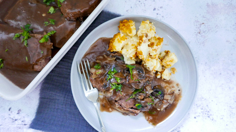 Slow cooker Smothered Steak on plate