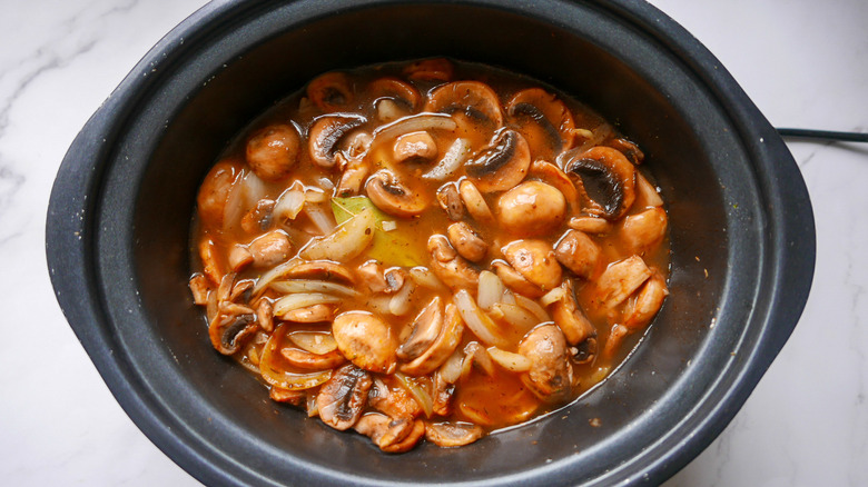 Slow cooker Smothered Steak in slow cooker