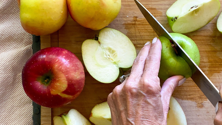 apples on a cutting board 