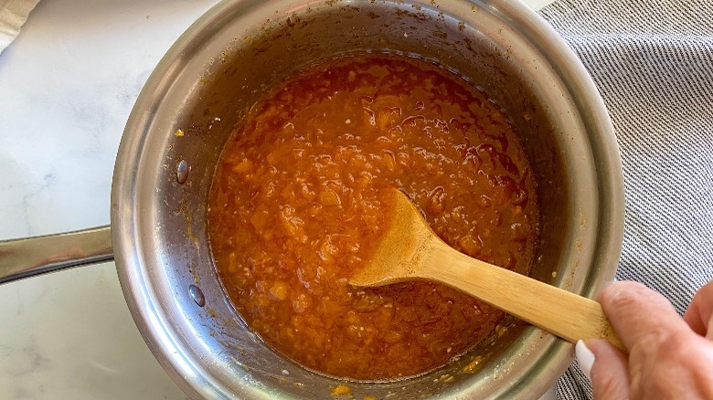 mashed peaches in pot