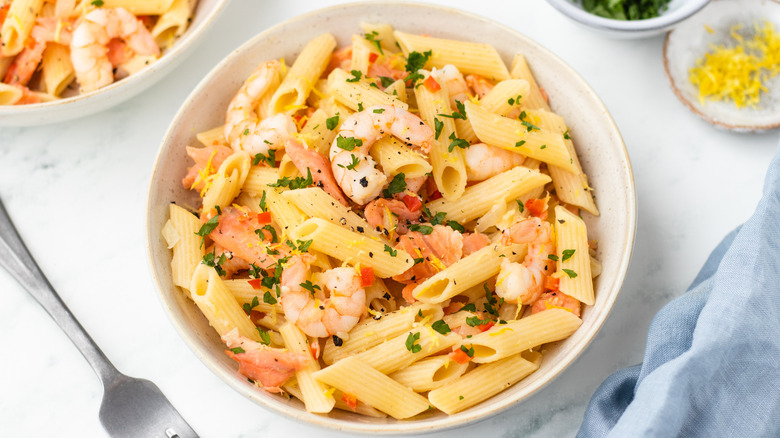 Smoked salmon and shrimp pasta in a bowl