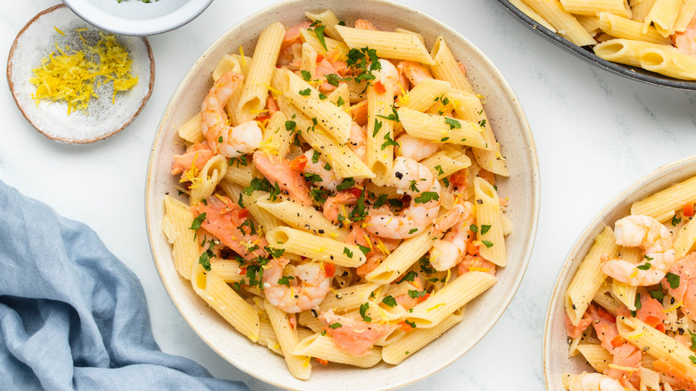 Smoked salmon and shrimp pasta in a bowl