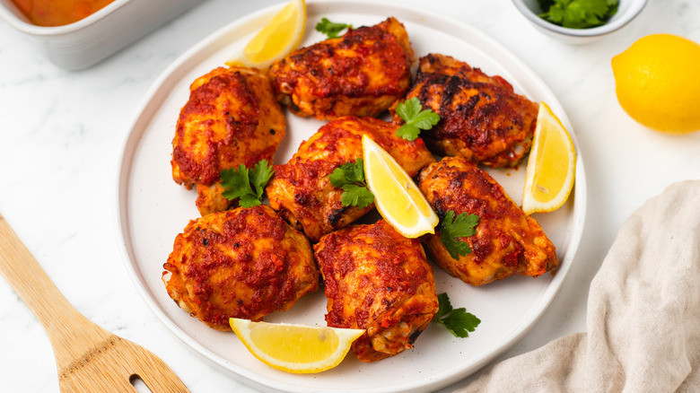 harissa chicken thighs on plate