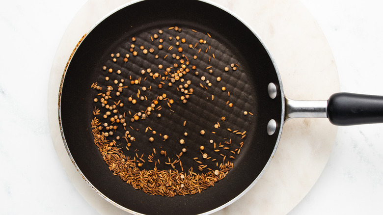 spices toasting in pan