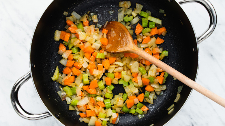 veggies sauteing in pot