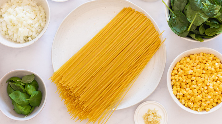 uncooked spaghetti on plate