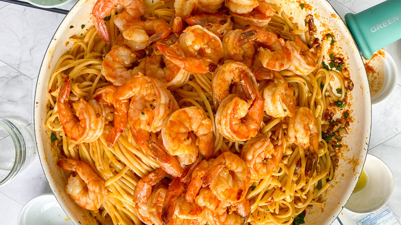 shrimp with linguine in pan