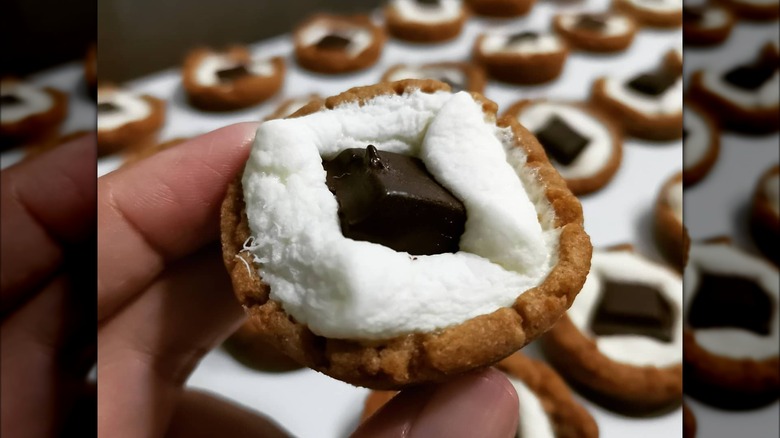 Person holding s'mores cookie cup