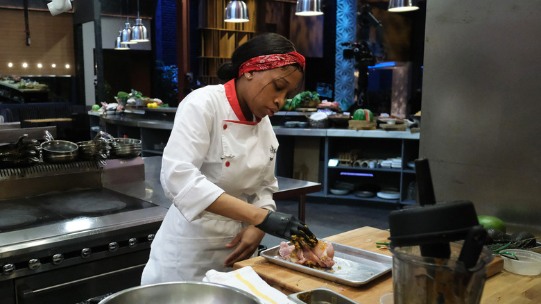 Sommer Sellers cooking in the kitchen