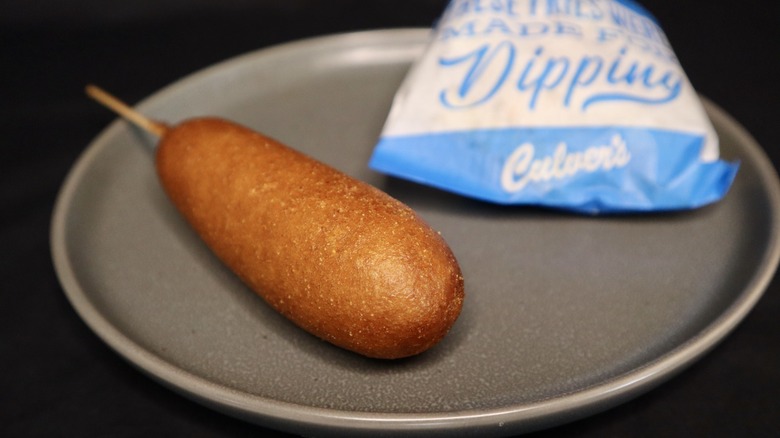 Culver's corn dog and fry package on plate