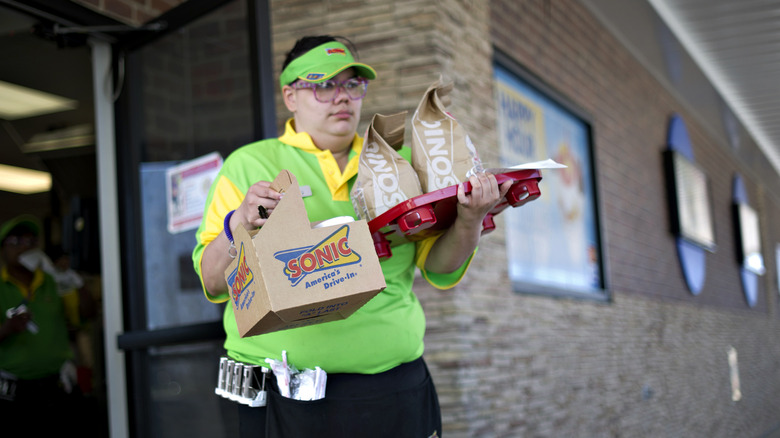 Person delivering a Sonic meal