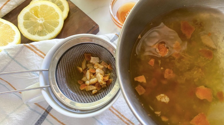 strained orange peel ginger tea