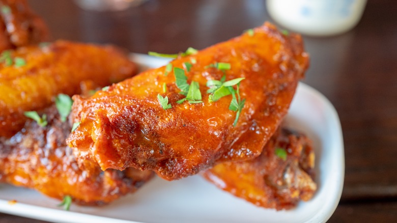 Buffalo wing flat on plate