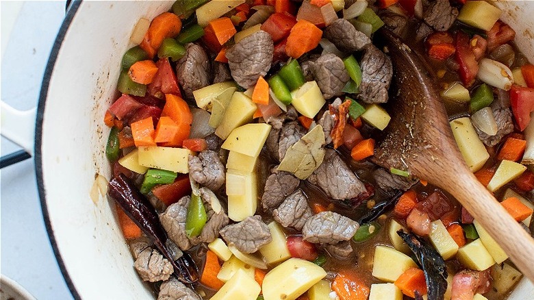 vegetables and beef in pot