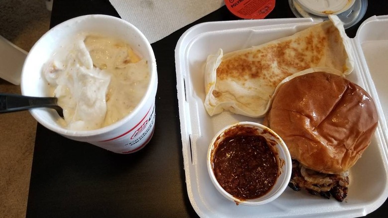 Tray with a Cajun Chicken Sandwich, Quesadilla, Chili, and a Peach Cobbler Milkshake from Cook Out in Hickory, North Carolina