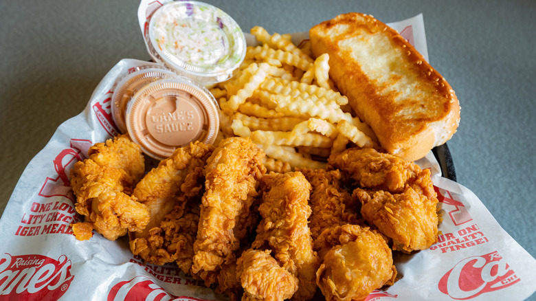 Raising Cane's soda cup and food platter