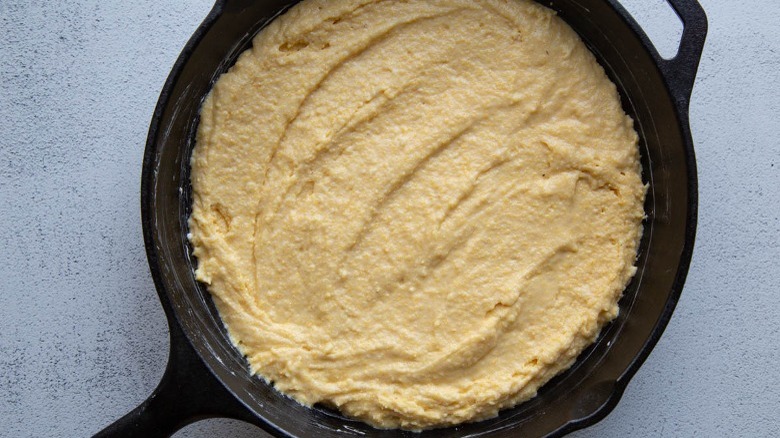 cornbread in skillet before baking