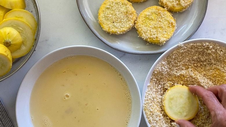 dredge squash slices in crumbs