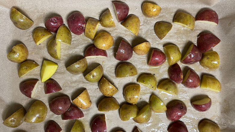 Chopped potatoes on sheet pan