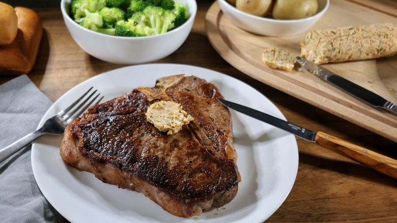 T-bone steak with pat of cowboy butter on top