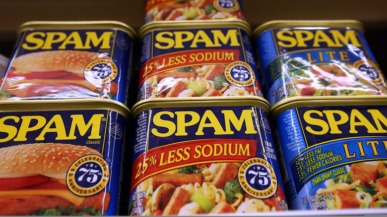 Spam cans lining grocery shelves 