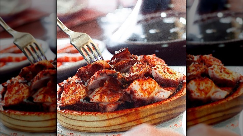 Octopus on wooden plate