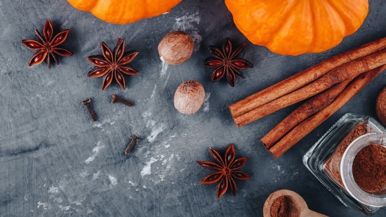 whole spices with pumpkins