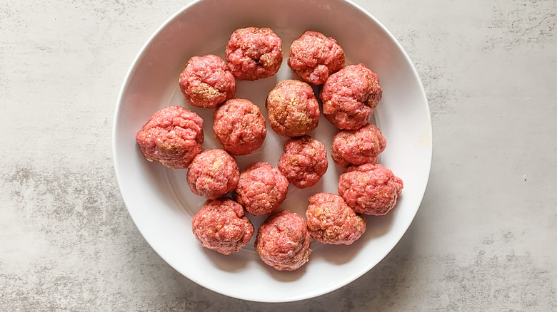raw meatballs on plate