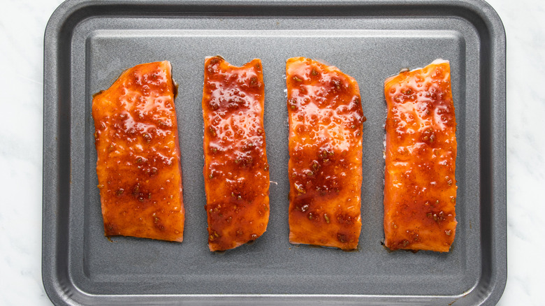 glazed salmon on baking tray 